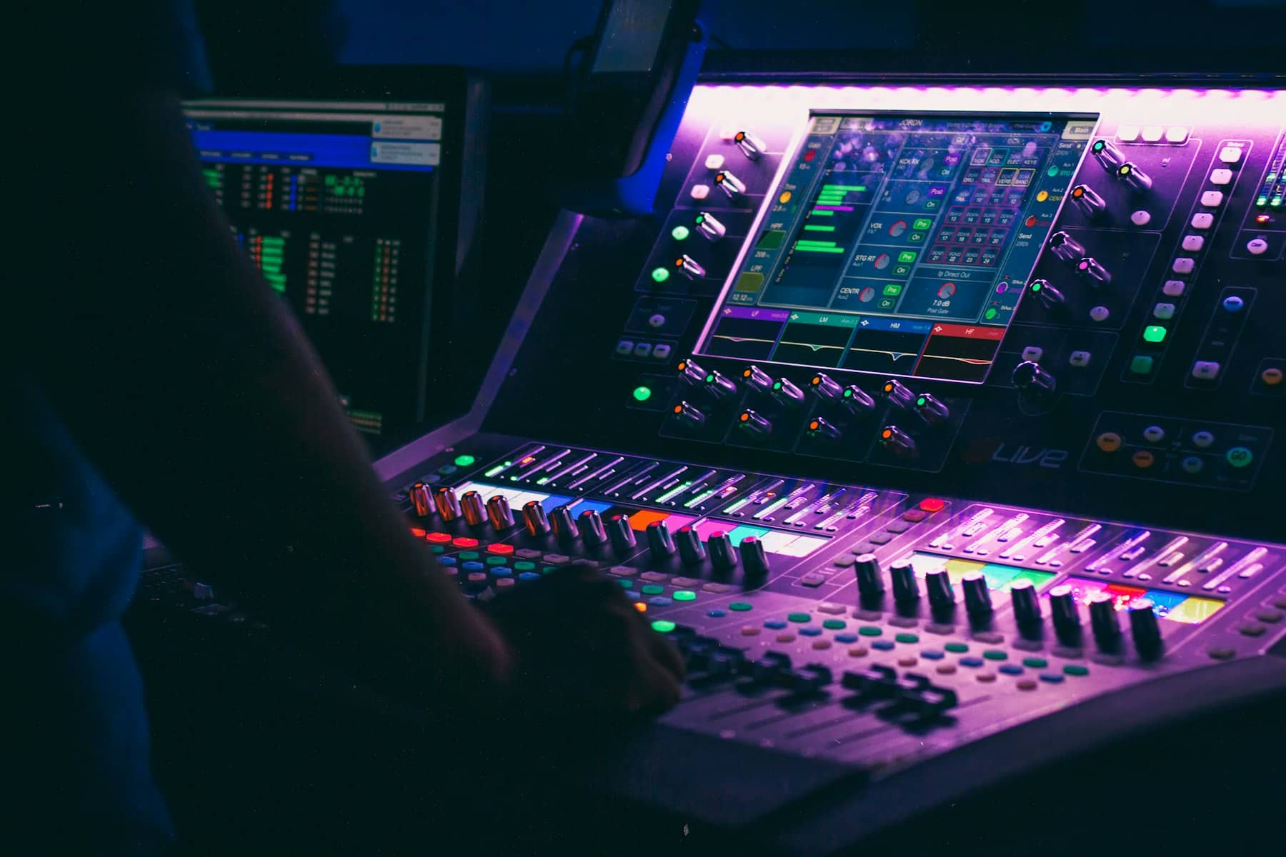 Close-up of a glowing mixing console